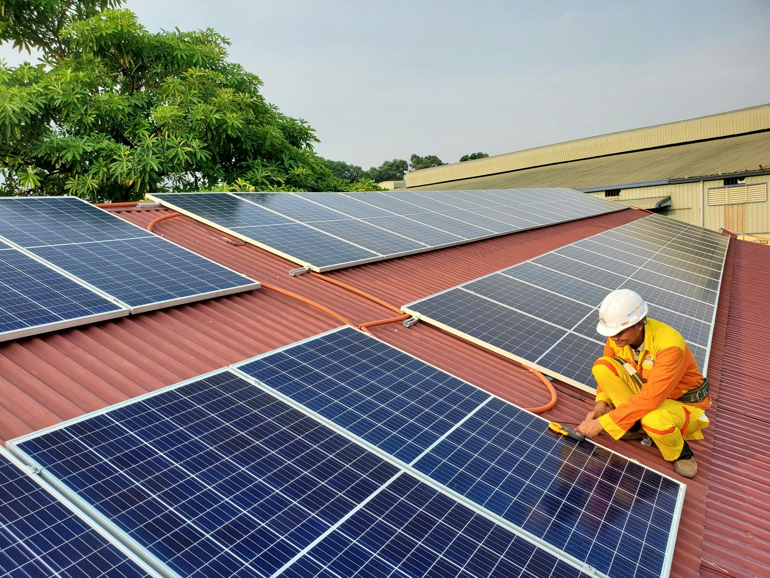 Happy Farmer with Solar Panels